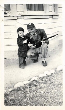 Me with my dad after a successful hunting trip.  He did better than I.