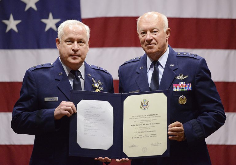 Maj. Gen William S. Hadaway III, Director of Logistics, National Guard Bureau, receives his certificate of retirement from former Director of the Air National Guard Lt. Gen. Harry M. Wyatt III (ret.), April 11, at the Brig. Gen. Joseph W. Turner complex, Tulsa Air National Guard Base, Okla.  Both Wyatt and Hadaway were former wing commanders at the 138th Fighter Wing in Tulsa.  (U.S. National Guard photo by Master Sgt. Mark A. Moore/Released)